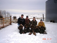 The gang with turkey's and pheasants in a December late season hunt at Antler Ridge Lodge.